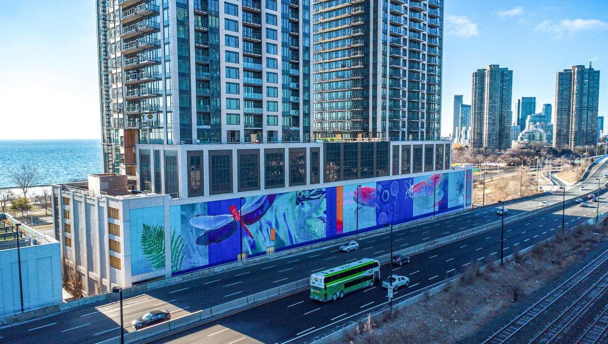 New condo celebrates lakefront biodiversity with 120-metre mural along the Gardiner